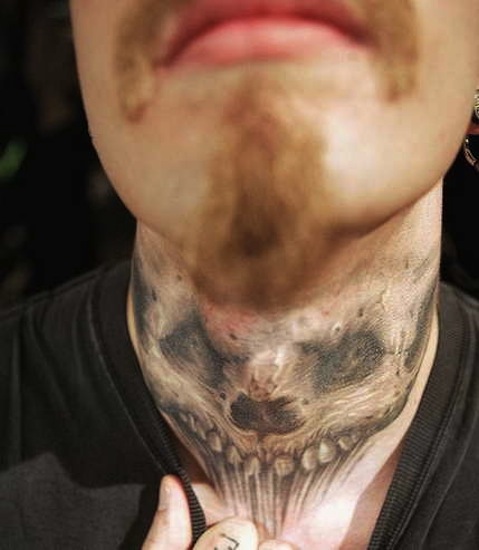 Impressive Realistic Skull Tattoo On Neck