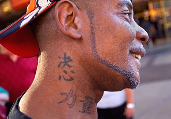 Japanese Language Tattoo On Neck