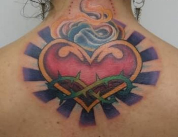 Large Heart Neck Tattoo