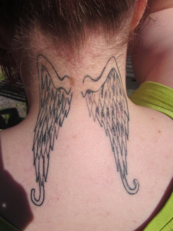 Large Wings Tattoo On Back Neck