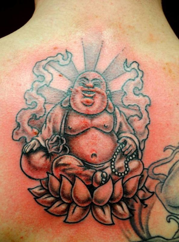 Laughing Buddha On Lotus Tattoo