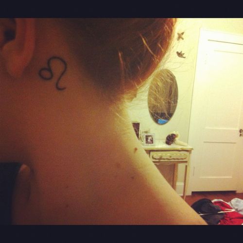 Leo Symbol Neck Tattoo