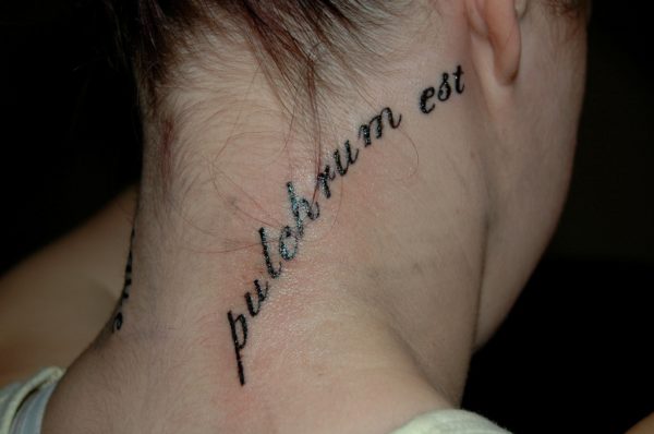 Lettering Tattoo On Neck