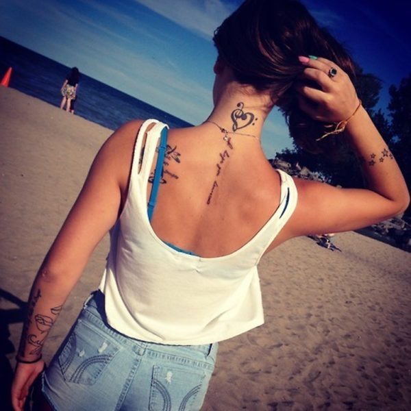 Love Musical Tattoo On Back Neck