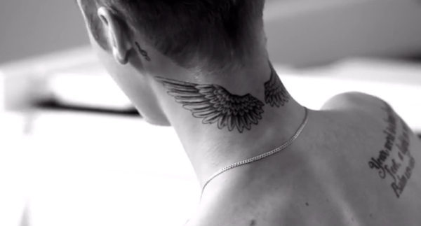 Lovely Bieber Neck Tattoo