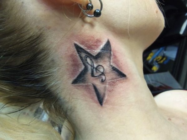 Music Star Tattoo On Neck