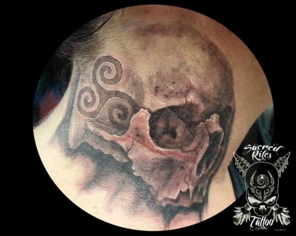 Neck Tattoo Of Skull