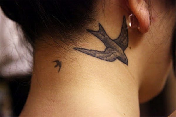 Nice Flying Bird Tattoo Design