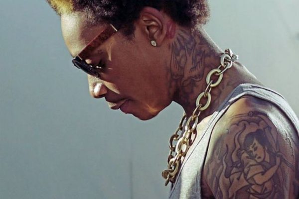 Nice Tattoo Design On Wiz Khalifa Side Neck