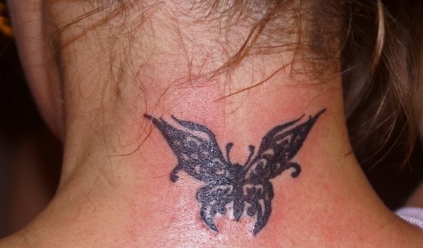 Nice Tribal Butterfly Tattoo On Neck