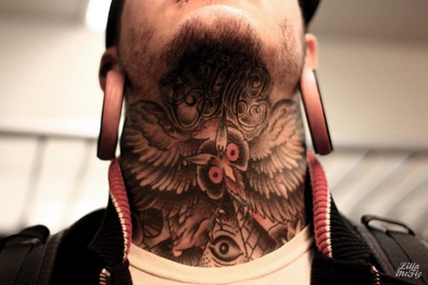 Owl Tattoo On Covered Neck