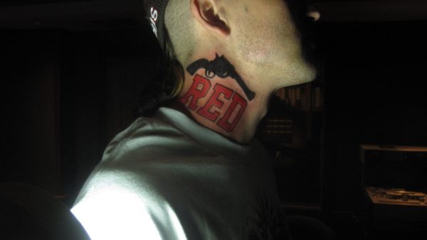 Pistol Tattoo On Yelawolf  Neck