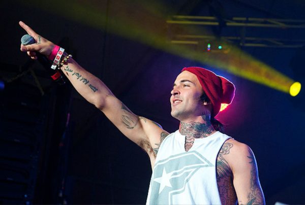 Red And Green Color Tattoo On Yelawolf  Neck