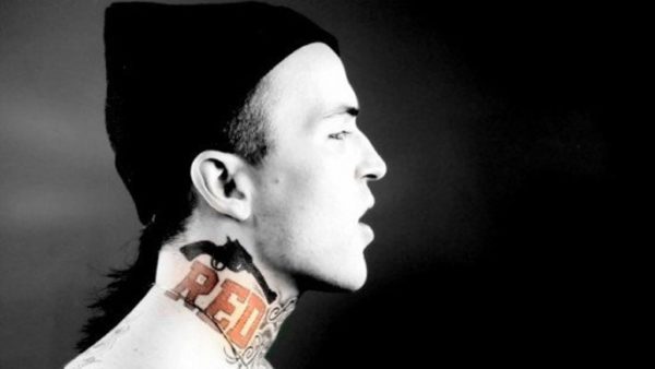 Red lettering Design Tattoo On Yelawolf  Neck