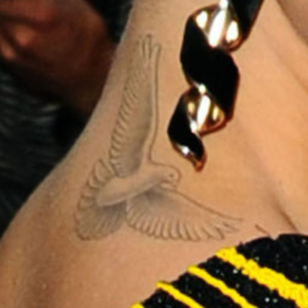 Rita Ora Bird Wing Tattoo On Neck 
