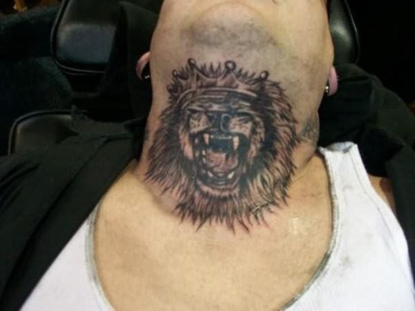 Roaring Lion Tattoo On Front Neck