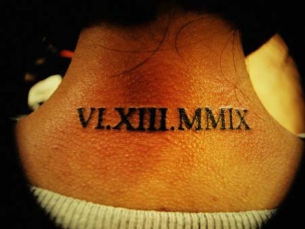 Roman Numeral Tattoo On Back Neck