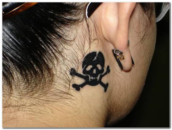 Skull Design Tattoo on Neck