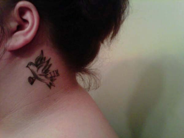 Small Bird Tattoo On Neck 