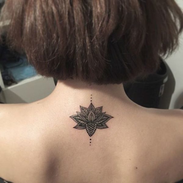 Small Black Lotus Tattoo On Neck