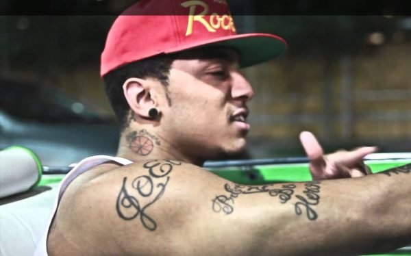 Small Flower Tattoo On Kirko Bangz Neck