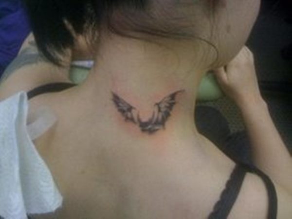 Small Flying bat Neck Tattoo