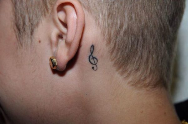 Small Music Note Tattoo On Neck