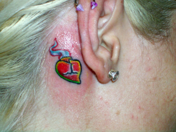 Small Red Heart Neck Tattoo