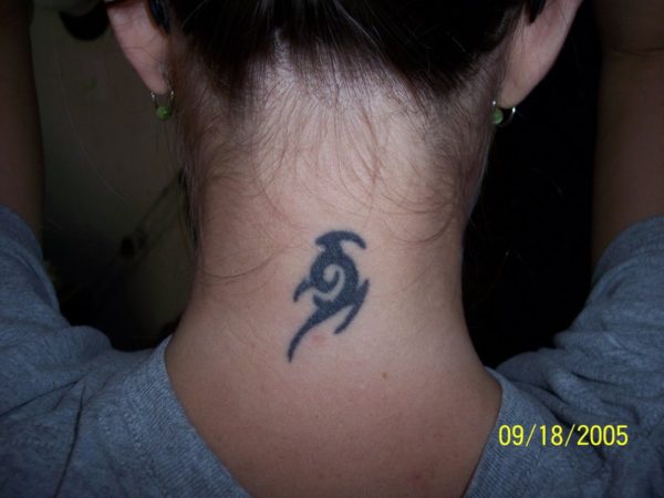 Small Tribal Tattoo On Neck