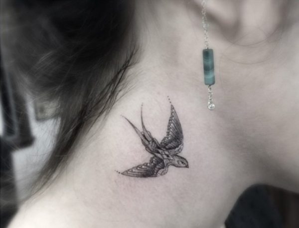 Stunning Bird Tattoo On Neck