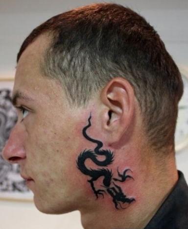 Stunning Dragon Tribal Tattoo