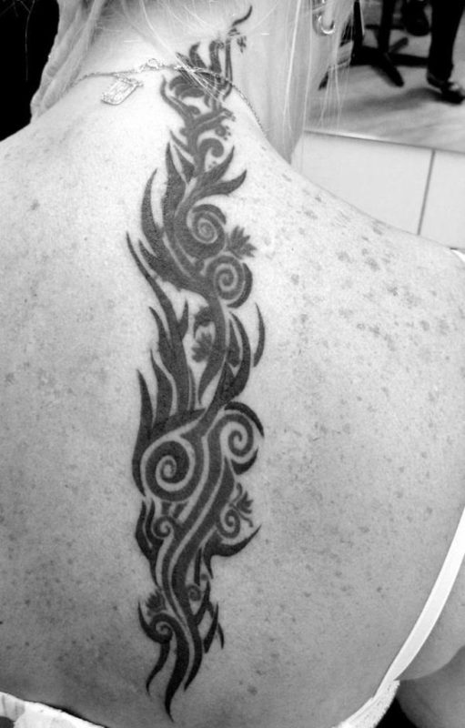 Stunning Hawaiian Tattoo On Neck