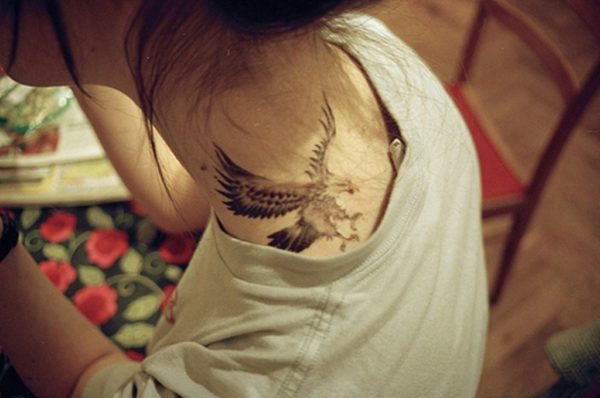 Stylish Bird Tattoo On Neck Back