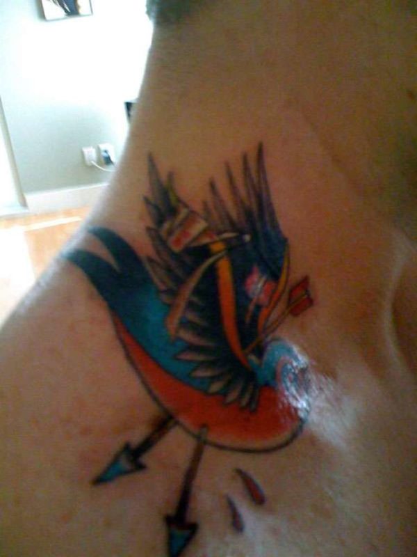 Sweet Colored Bird Tattoo On Neck