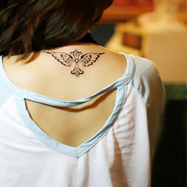 Sweet Wing Tattoo On Back Neck 
