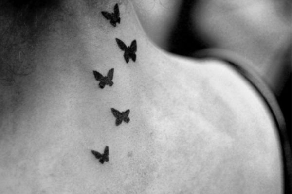 Tiny Black Butterfly Tattoo On Neck