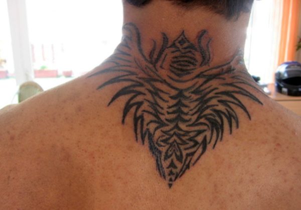 Tribal Design Wing Tattoo On Back Neck 