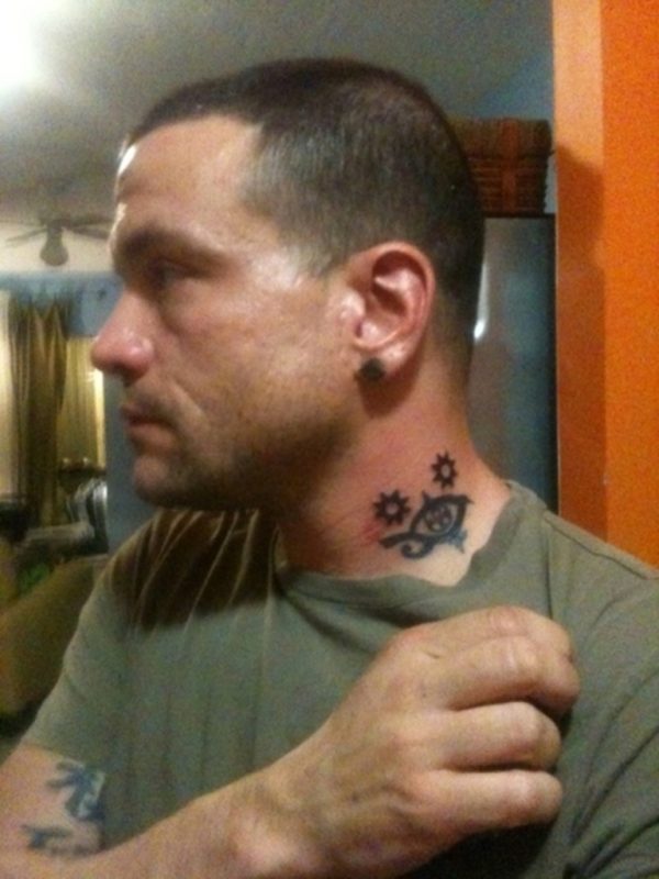 Tribal Eye Tattoo On Neck