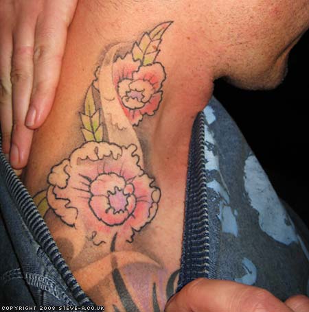 Tribal Flower Tattoo On Neck
