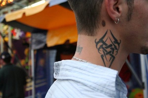 Tribal Japanese Tattoo On Neck