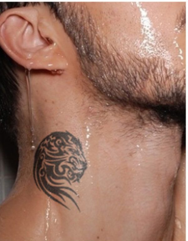 Tribal Lion Face Tattoo On Neck