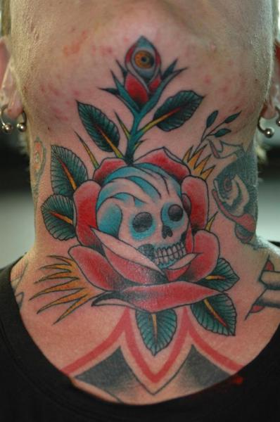 Unique Skull Tattoo On Neck