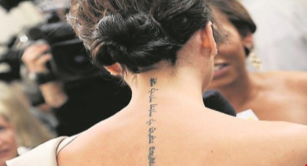 Victoria Beckham Lettering Tattoo