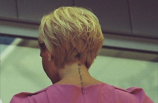 Victoria Beckham Tattoo On Neck back