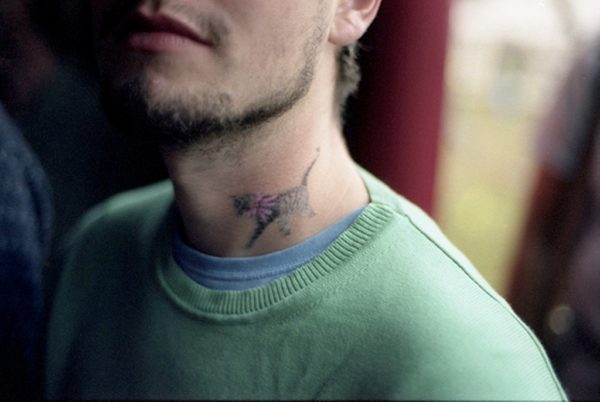 Walking Cat Tattoo On Neck