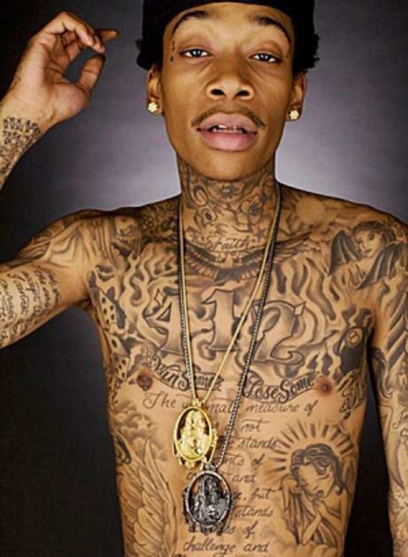 Win Some Tattoo Desing On Wiz Khalifa Neck