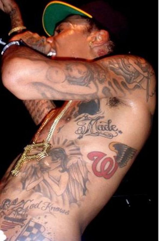 Wiz Khalifa New Design Tattoo On Neck