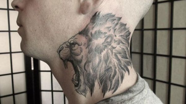 Wonderful Lion Tattoo On Neck