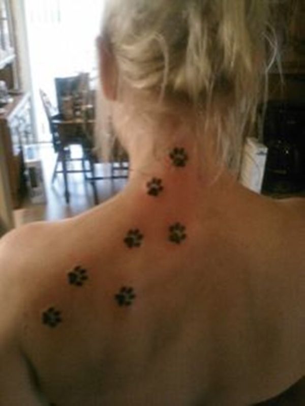 Wonderful Paw Tattoo On Back Neck