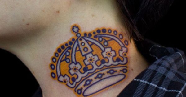 Yellow Crown Tattoo On Neck